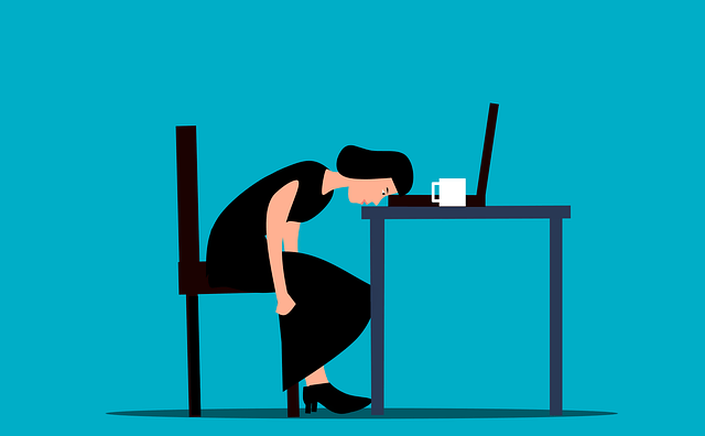 An cartoon illustraton of a woman head-desking over her open laptop. She's probably an indie fantasy publisher who just lost a day's work to computer malfunction.