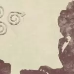 On a neutral background, a silhouette pauses with its fingers on its chin, contemplating a computer screen with arrows spiraling before it. Looks like writer's block, but it might be depression.